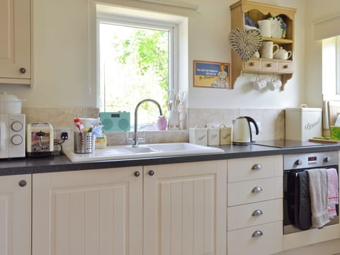 Well-equipped fitted kitchen | Mill Cottage, Stillington, near York
