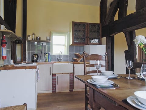 Kitchen/diner | Hirros Hall Longhouse, Llanerfyl, nr. Welshpool