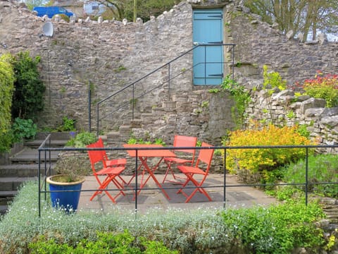 Private terraced garden with table and chairs | Beech Hill, Kendal