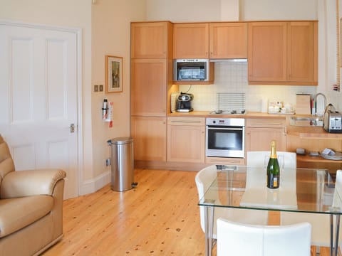 Wood floored open plan living area | Tides Reach, Fowey