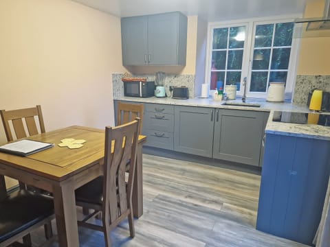 Well equipped kitchen/ dining area | Snowdon - The Woollen Mill, Penygroes, near Caernarfon