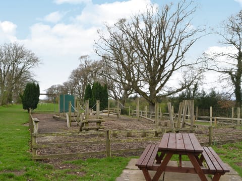 Superb children&rsquo;s play area and picnic style outdoor seating | Blaithwaite House - Blaithwaite Estate, Waverton, near Wigton