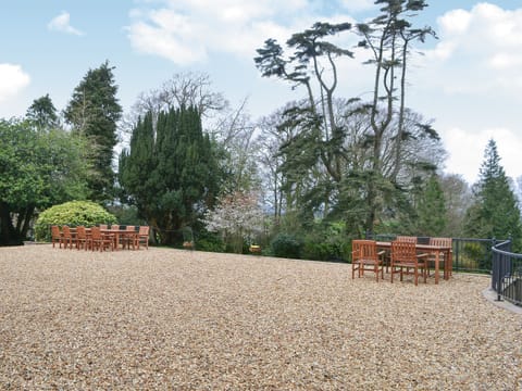 Gravelled terrace with alfresco dining facilities | Blaithwaite House - Blaithwaite Estate, Waverton, near Wigton