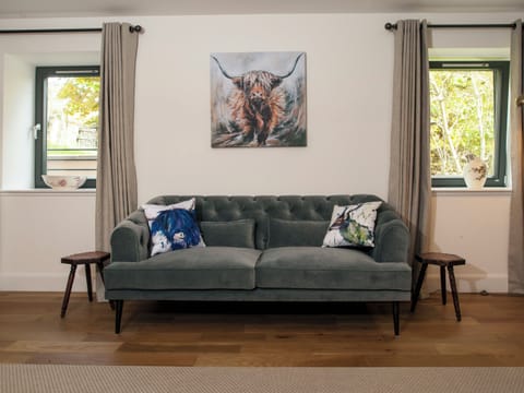 Seating area within the master bedroom | Strathspey Lodge, Duthil, Carrbridge, near Aviemore