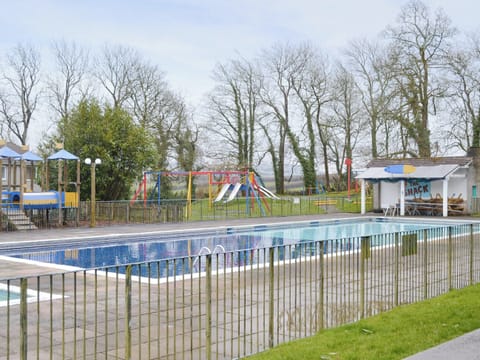 On-site swimming pool and children&rsquo;s play area | Newquay Holiday Villa, Newquay