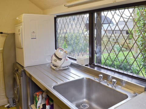 Useful laundry/utility room | The Barn at Woodland View, Barlow, near Chesterfield