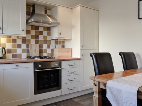 Kitchen with dining area | 1 The Costins, Allonby, near Maryport