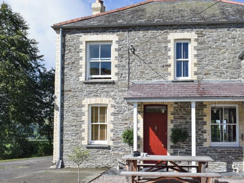 Patio at front of main entrance | Tyllwyd Farmhouse, Capel Bangor, near Aberystwyth