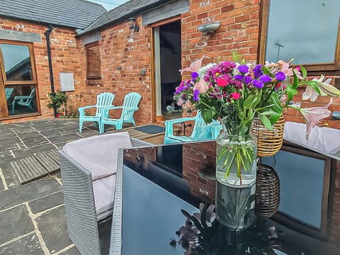 Sitting-out-area | Bramble Barn - Middle Huntingford Barns, Charfield, near Wotton-under-Edge