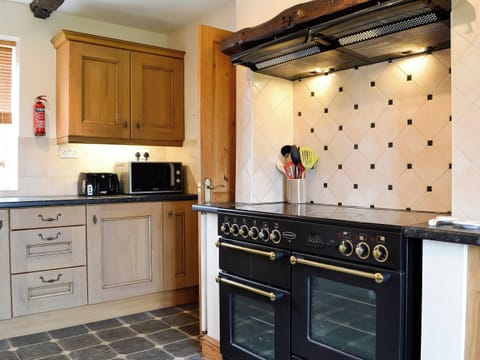 Kitchen with double range cooker | Farm Cottage - Springfield Farm Cottages, Bigrigg, near Egremont
