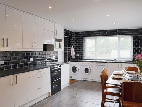 Contemporary tiling and lovely fitted kitchen units housing modern appliances | The Briar Rose, Shiney Row, near Houghton-le-Spring