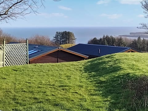 Far reaching sea views from the garden | The Cottage, Dulas, Anglesey
