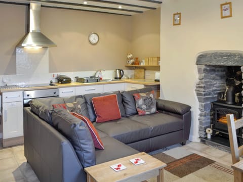 A well-equipped kitchen completes the open plan living space | Tan y Bryn, Prenteg, near Porthmadog