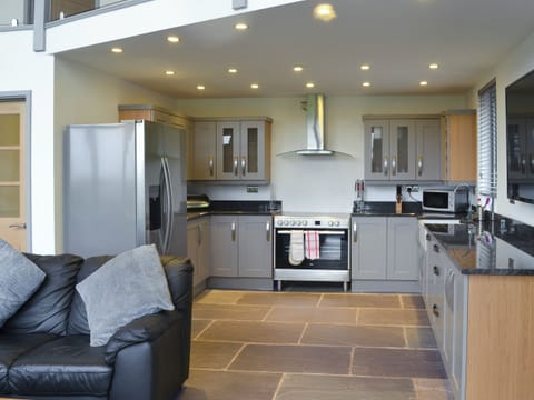 Well-equipped kitchen with electric range | Heartwell Cottage - Bowlees Holiday Cottages, Wolsingham, near Stanhope