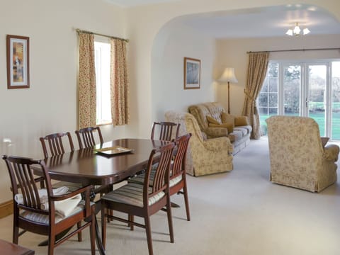 Stylish dining area within living and dining room | Alby Bungalow, Cumwhinton, Carlisle