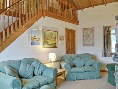 Stairs lead from living area to mezzanine | Tigh na&rsquo; Caoiraich, Invergarry, Tomdoun