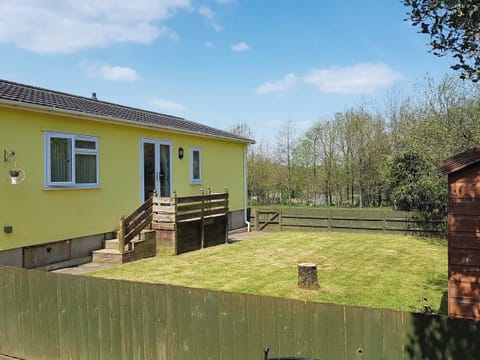 Enclosed garden to rear of property | Acacia - Thornbury Holiday Park, Woodacott, near Holsworthy