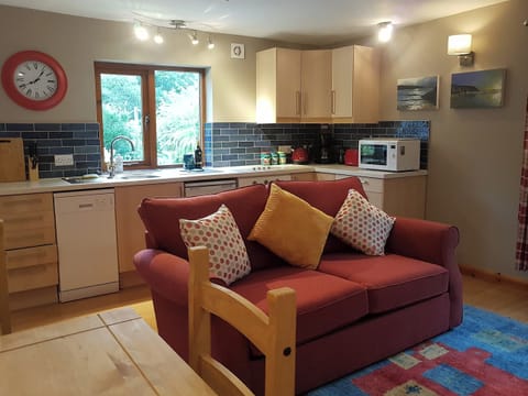 Open plan living space with wooden floor | Penty-Lowarth, Quoit, St Columb