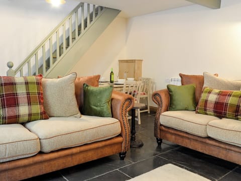 Living room with slate flooring | Maybill Cottage, Cwm Penmachno, near Betws-y-Coed