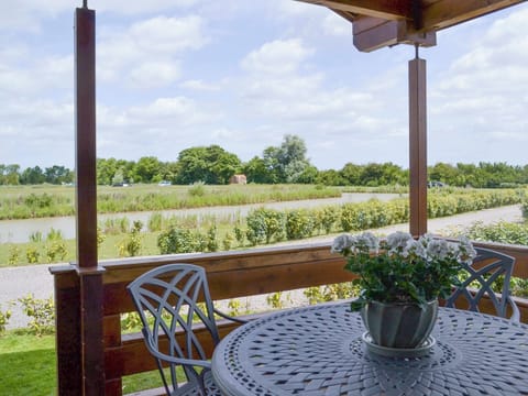Spectacular views from the veranda | Hazel Lodge - Faulkers Lakes, Burgh le Marsh, near Skegness