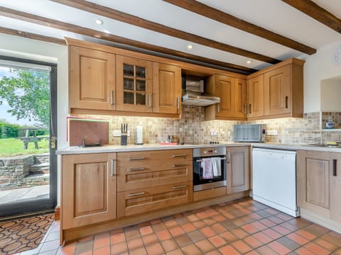 Kitchen | Rhandir Barn - Cennen Cottages at Rhandir Farm, Trapp, near Llandeilo