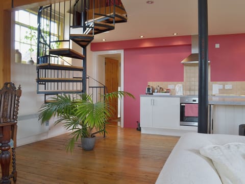 The polished wood fllors reflect the grandeur of the living space | Little Burcott Loft, Burcott, Wells