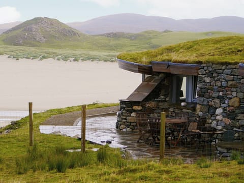 Superb natural stone cottage with turfed roof | Beach Bay Cottage, Carnish, Uig, Isle of Lewis