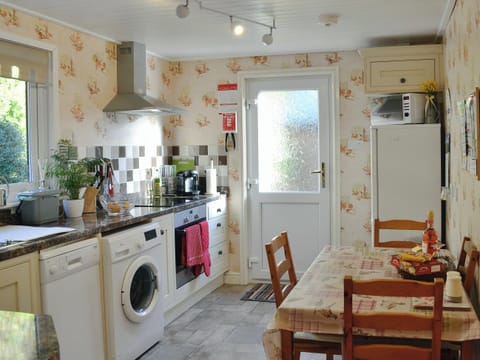 The large kitchen/dining room has a breakfast area | Bryn Rodyn, Graigfechan, near Ruthin