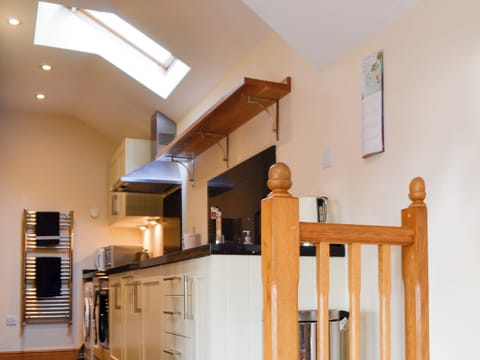 Lovely kitchen with overhead skylight | Stratton Mill, Cirencester