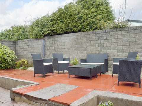 Large patio with outdoor furniture | Sea Breeze, The Mumbles