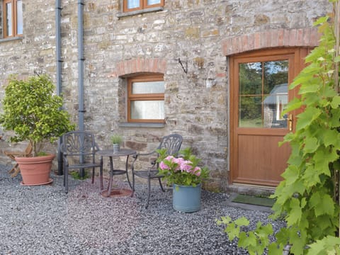 Gravelled patio area | Mill Cottage - Pendegy Mill, Llanybri, near Carmarthen