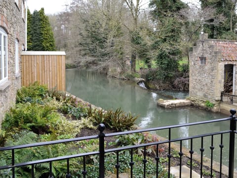 Lovely view over garden to river | Dippers’ Folly - Jeffries Mill Cottages, Spring Gardens, Frome