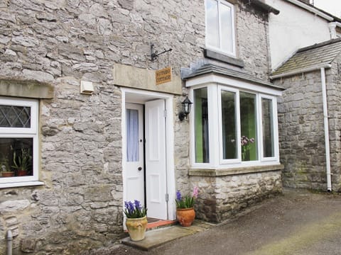 Stone-built, traditional terraced cottage | Nutmeg Cottage, Tideswell, near Buxton