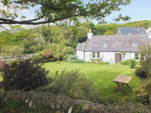 Lovely lawned garden with shady eating area | Gullieside Cottage, Kirkandrews, near Kirkcudbright