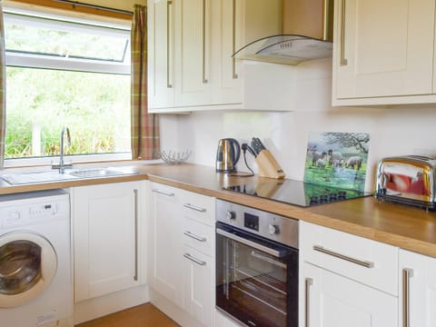 Well-equipped fitted kitchen | Cuillin View, Husabost, Isle of Skye