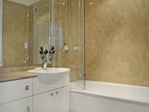Bathroom with shower over bath | Summerlea Cottage, Moffat