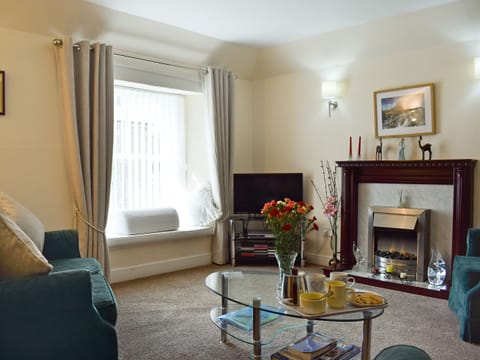 Homely living room | Caroch Cottage, Comrie, near Crieff
