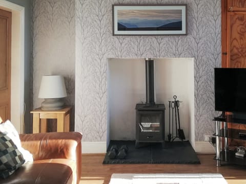 Attractive living room with wood burner | Glaramara, Kendal