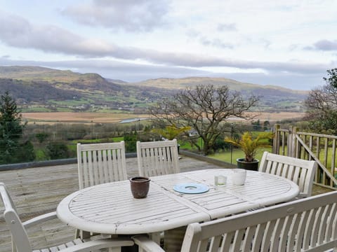  Large decked area with sitting-out area, garden furniture and gas BBQ | Bryn Hyfryd, Maenan, near Llanrwst