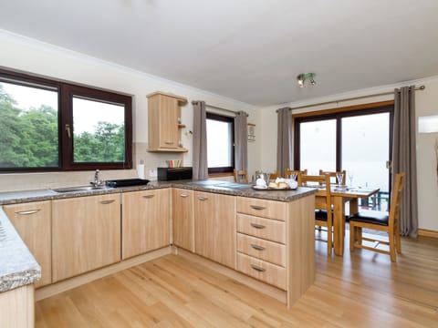 Spacious kitchen and dining area | Loch Duich Cottage, Inverinate, by Kyle