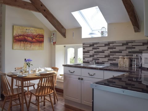 Kitchen with dining area | Upper Mill Barn - Pantgwyn Farm Cottages, White Mill, near Carmarthen