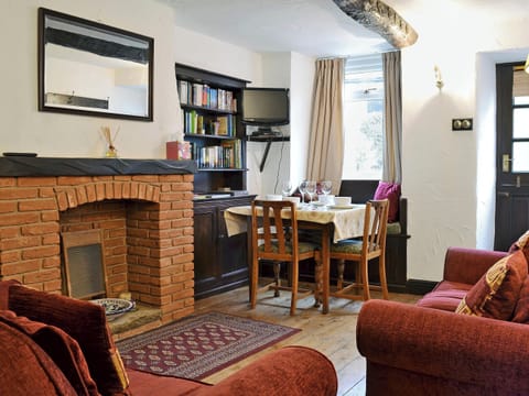 Warm and welcoming living room with beams | Michill Cottage, Castleton, near Buxton