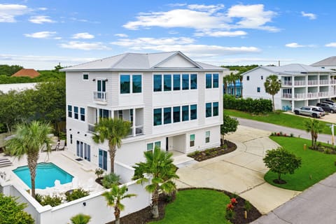 House Exterior with pool and ample parking and beautiful landscaping