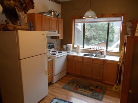 The kitchen has all your needs for cooking.