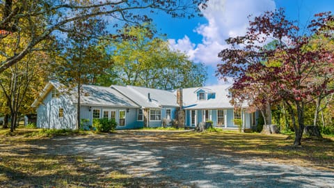 The Farmhouse sleeps up to 21. Seven bedrooms/four baths.  Almost 5,000 sq ft.