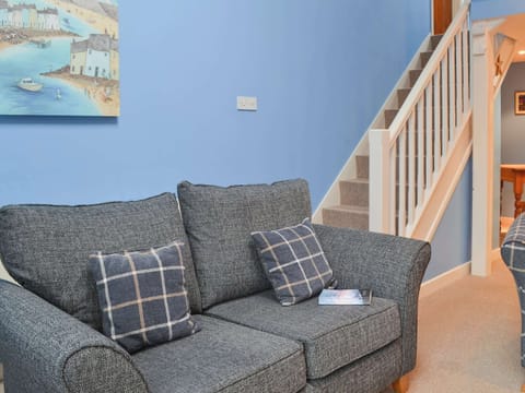 Charming living room with staircase to first floor | Wheelwright Cottage, Halwill