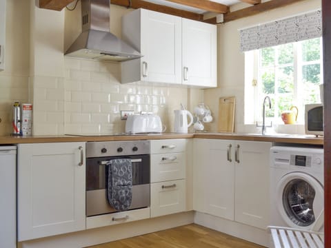 Well-equipped fitted kitchen. | Repton Cottage - Foremark Cottages, Milton, near Repton