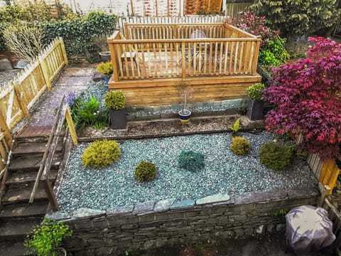 Decked sitting out area | Riverbank Cottage, Keswick