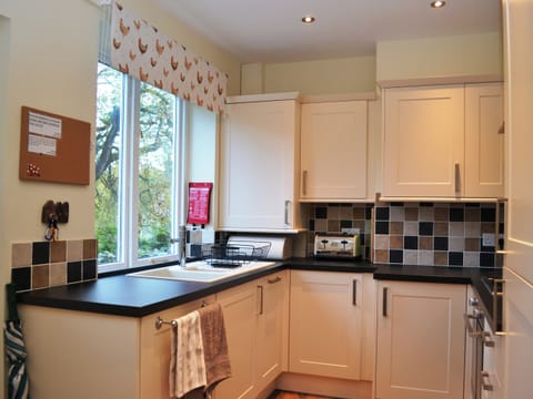 Kitchen | Riverbank Cottage, Keswick