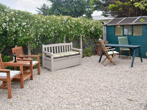 Sitting out area on gravelled patio | Anchorage, Maidens